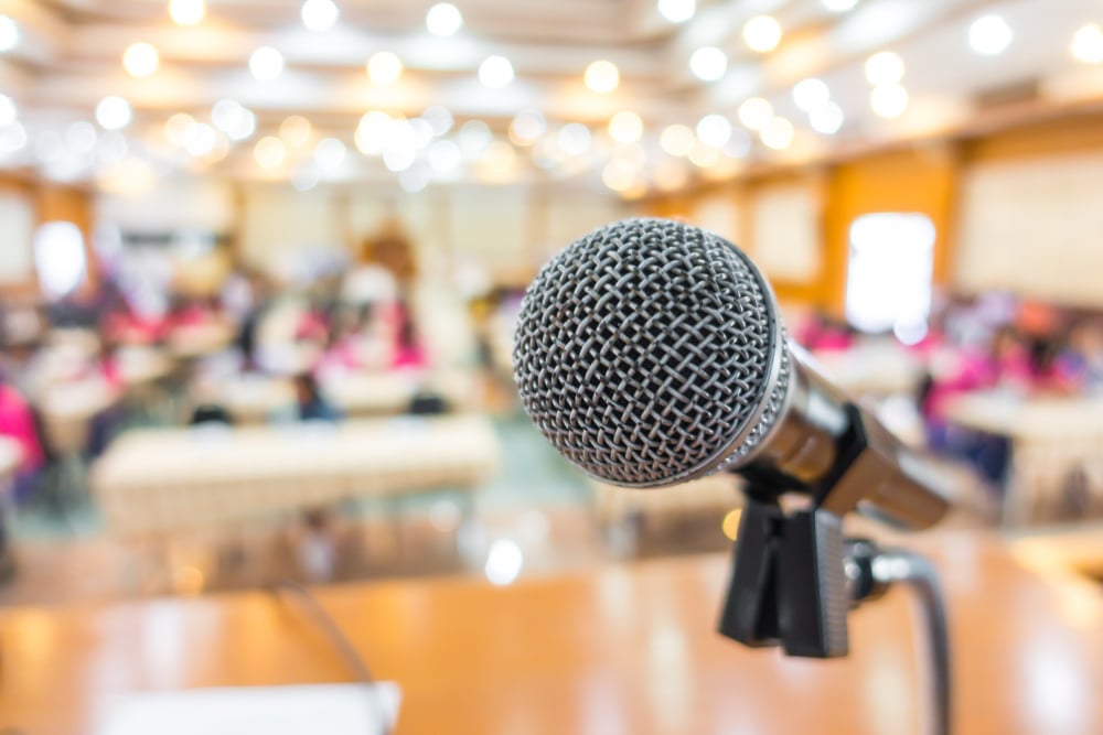 black-microphone-in-conference-room